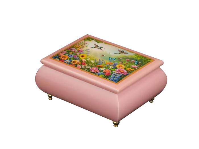 Floral Fantasy floral music box — close-up of the pink lacquered lid with a hummingbird over a wildflower garden, handcrafted in Sorrento