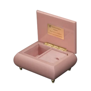 Garden Joy music box shown open, with pink velvet interior and gold wind-up movement, made in Sorrento