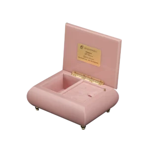 Victorian Serenade music box shown open, with pink velvet interior and gold wind-up movement, made in Sorrento