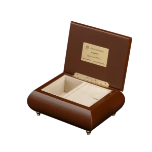 Golden Sunset Dreams music box shown open, with cream velvet interior and gold wind-up movement, made in Sorrento