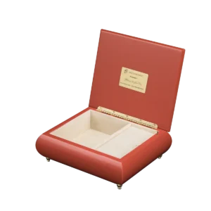 Melody of the Neon City music box shown open, with cream velvet interior and gold wind-up movement, made in Sorrento