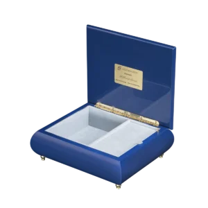 A Moonlight Serenade music box shown open, with light blue velvet interior and gold wind-up movement, made in Sorrento