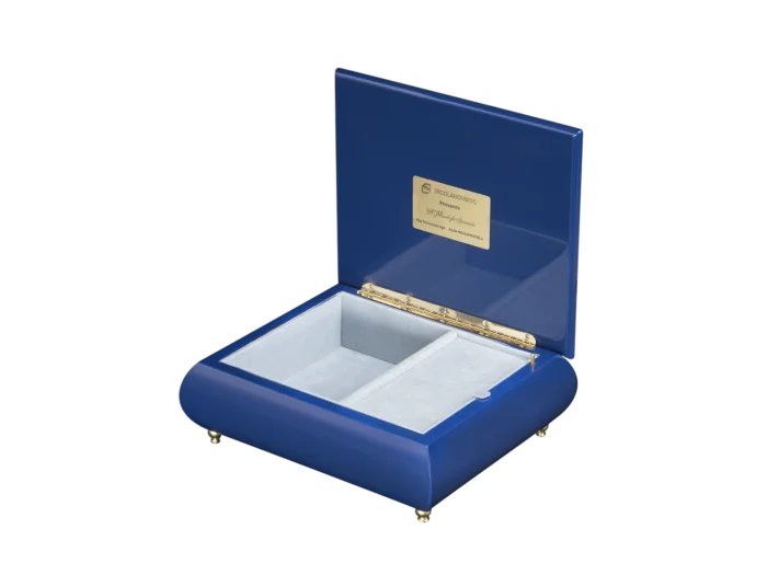 A Moonlight Serenade music box shown open, with light blue velvet interior and gold wind-up movement, made in Sorrento