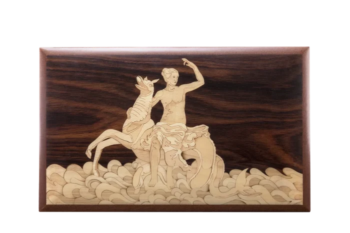 Lid of the Partenope music box: the siren Parthenope riding a hippocampus over the waves, hand-cut in wood marquetry