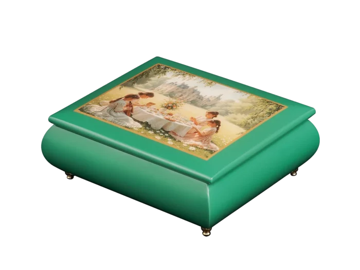 The Enchanted Picnic Victorian picnic music box — close-up of the green art lid with young women at a lace-set picnic table on a chateau lawn, one of them playing the violin, handcrafted in Sorrento