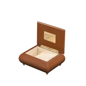 The Garden Clock music box shown open, with its velvet-lined interior and gold wind-up movement, made in Sorrento