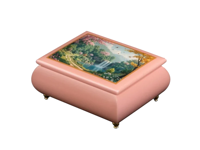 Serene Sanctuary waterfall music box — close-up of the pink art lid with a waterfall spilling into a wooded valley, with blossoming trees and a winding path, handcrafted in Sorrento